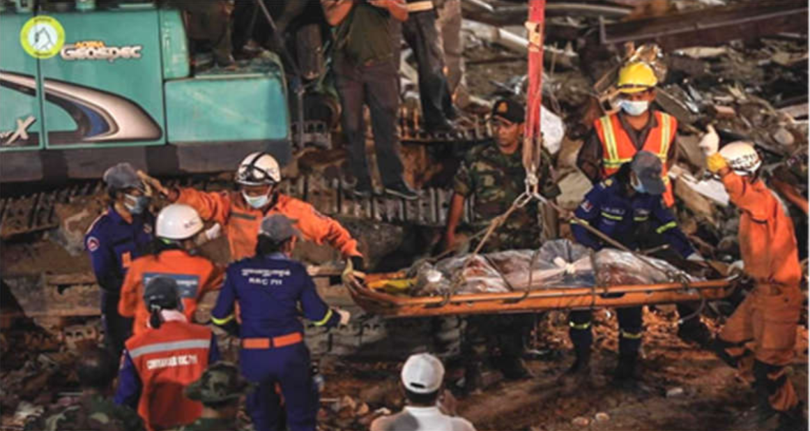 Rescue teams pull out victims from the rubble.